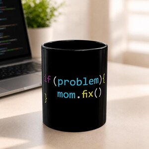May include: A black ceramic mug featuring colourful programming code text that reads: if (problem){ mom.fix() }. The text is printed in purple, light blue, and yellow against the solid black background of the cylindrical drinking vessel.
