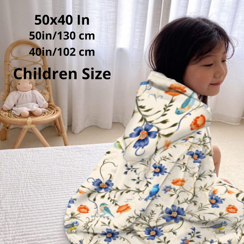 Hooded blue blanket personalised  with your name in a white bold letters.