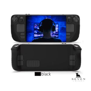 May include: A black handheld gaming console with a screen showing a person wearing headphones and playing a video game. The console has a textured black case with buttons and a touchpad. The text "SEVEN BYTES" is visible in the lower right corner of the image.