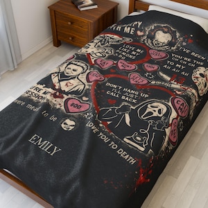 60x80 personalized horror blanket displayed on a bed, horror movie lover custom name velveteen queen blanket with creepy love quotes, gothic gift for scary movie fans, large cozy horror themed bedding.
