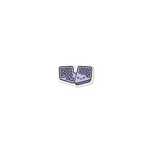 May include: A sticker of a split keyboard with a smiling face. The keyboard is light purple with dark purple keys and a white border. The sticker is set against a white background.