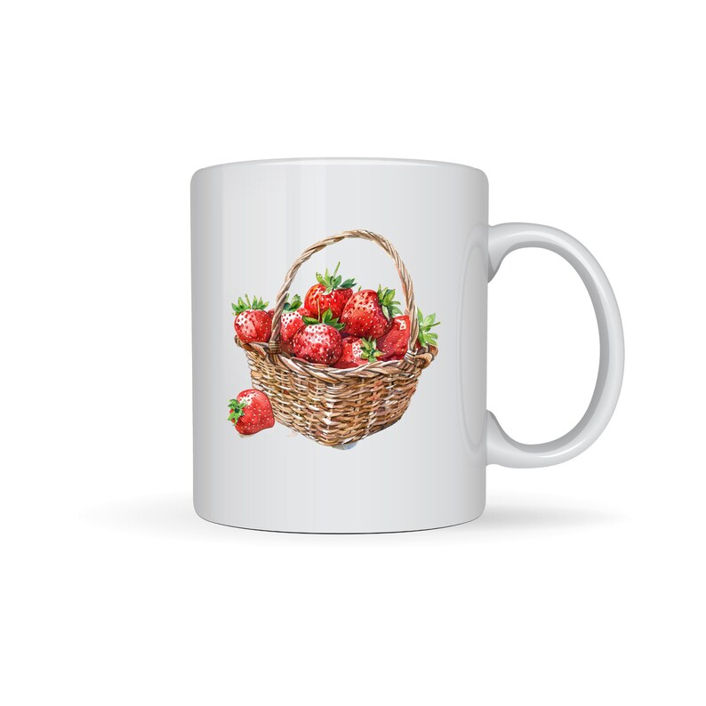 May include: White ceramic mug featuring a watercolour illustration of a wicker basket full of red strawberries.