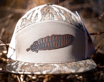 Mossy Oak Bottomland Camo 7 Panel Hat - Leather Turkey Feather  Patch - Snap Back Hats