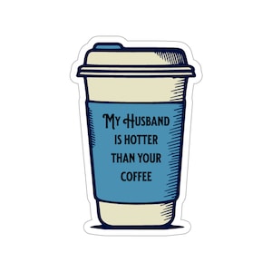 May include: A sticker of a coffee cup with the text "My Husband is Hotter Than Your Coffee" printed on it.
