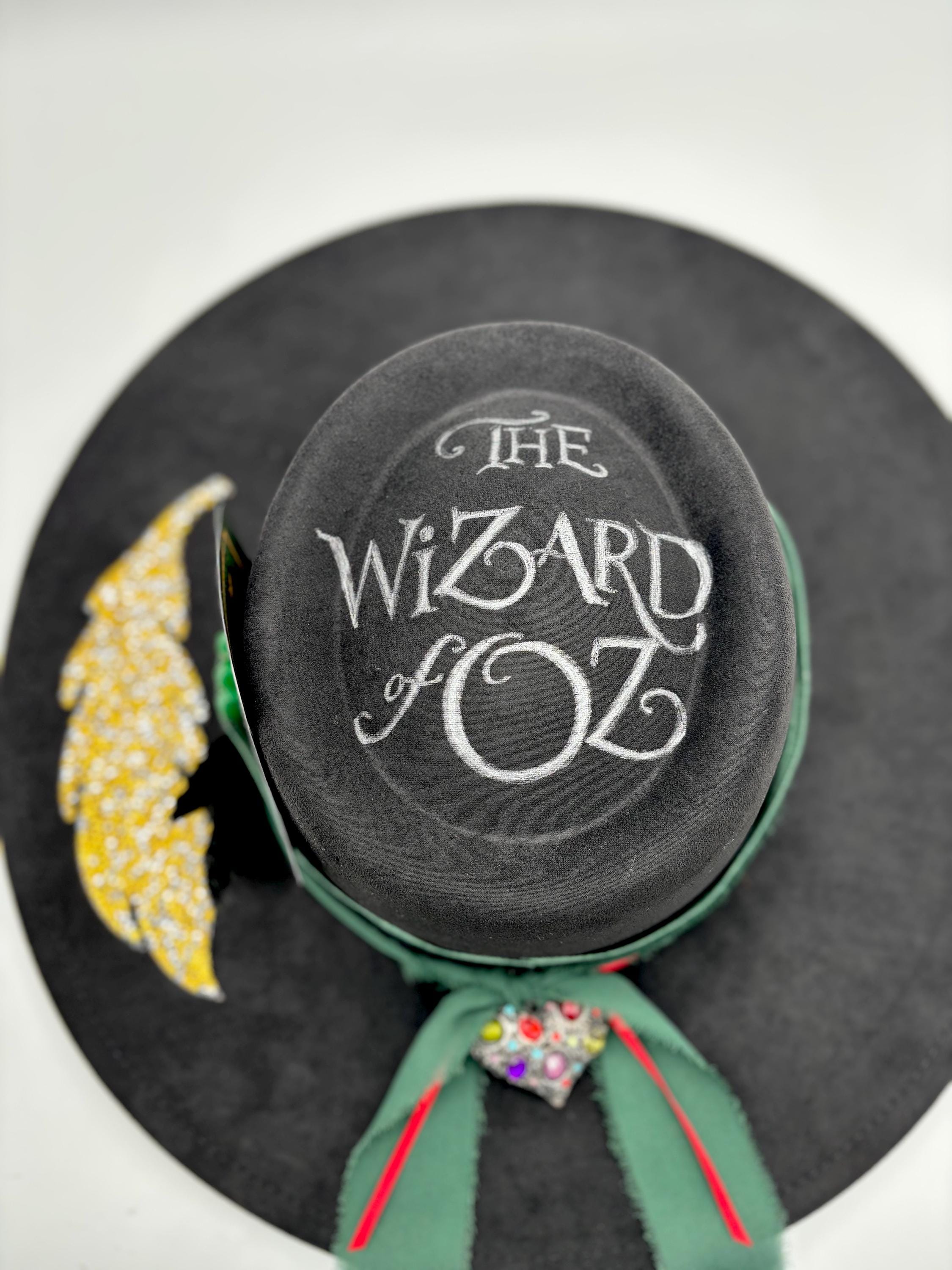 Burned Black Suede Fedora: Wide Brim flat hat, "The Wizard of Oz" themed with Oz playing cards, emerald city crystals and bedazzled feather
