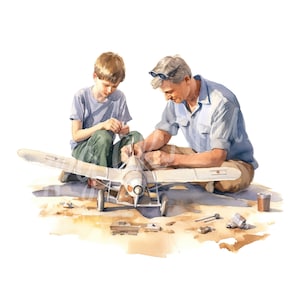 Pode incluir: Um pai e seu filho est&atilde;o trabalhando juntos em um avi&atilde;o de modelo. O modelo &eacute; um biplano branco e cinza com detalhes vermelhos. O pai est&aacute; vestindo uma camisa azul e cal&ccedil;as c&aacute;qui, enquanto o filho est&aacute; vestindo uma camisa azul e cal&ccedil;as verdes. Ambos est&atilde;o sentados no ch&atilde;o, que est&aacute; coberto de areia.