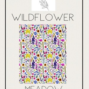 May include: A floral pattern featuring a variety of wildflowers in shades of pink, yellow, blue, and purple on a white background. The words "WILDFLOWER" and "MEADOW FLOWERS" are displayed in a minimalist font. The image also includes a logo that says "joy by j&j".