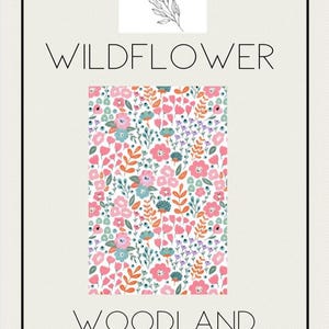 May include: A floral pattern with pink, blue, and orange flowers and green leaves on a white background. The words "WILDFLOWER" and "WOODLAND FLORAL" are displayed in black text. The image also includes the text "joy by j&j" above the floral pattern.