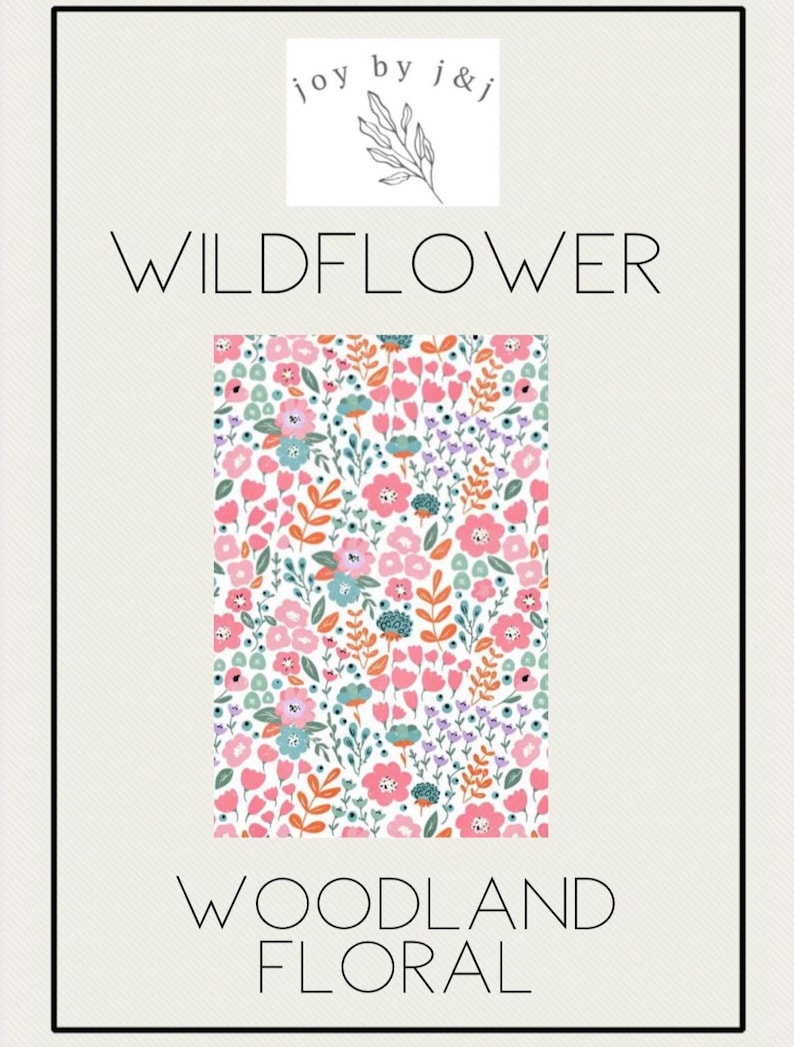 May include: A floral pattern with pink, blue, and orange flowers and green leaves on a white background. The words "WILDFLOWER" and "WOODLAND FLORAL" are displayed in black text. The image also includes the text "joy by j&j" above the floral pattern.