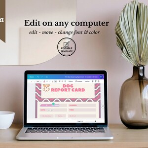 Op de afbeelding: Een laptopcomputer waarop een Canva-ontwerptemplate voor een hondenrapportkaart wordt weergegeven. De sjabloon bevat een cartoonhond met roze en blauwe accenten en de tekst "HONDENRAPPORTKAART".