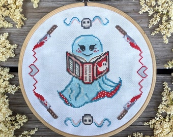 May include: A blue ghost reading a book titled "The Ghost Next Door" with a red and white cover. The ghost is holding the book with its hands and has a happy expression on its face. The background is a white canvas with red and white accents.