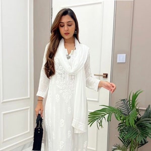 White dress store designs pakistani