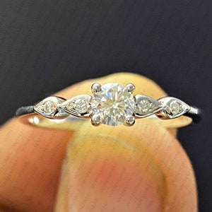 Round Cut Moissanite Engagement Ring: 14K White Gold Solitaire