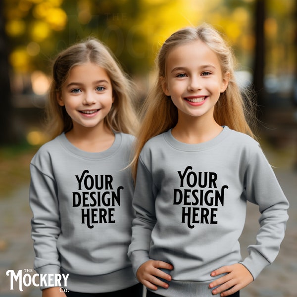 Two Sisters in Sport Grey Gildan 18000b Sweatshirts mockup | 2 Kids Mockup | 18000b Gildan Mockup | 18000 Sport Grey Mockup | 2 Girl models