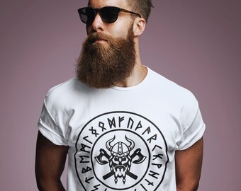 Discover Norse culture with our Futhark shirt, engraved with ancestral symbols and a Viking skull.