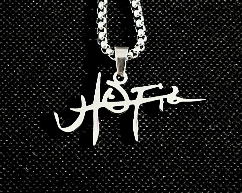 トラヴィススコットUTOPIAキーチェーン Amazon.co.jp: [JANUA] トラヴィス スコット Travis Scott