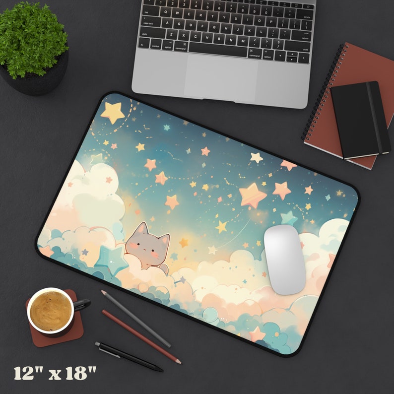 Puede incluir: Un rat&oacute;n de ordenador azul y blanco con un gato de dibujos animados en una nube, rodeado de estrellas. El rat&oacute;n de ordenador mide 30,5 cm por 45,7 cm.