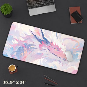 May include: A large pink and white dragon-themed mousepad with a detailed illustration of a dragon's face. The mousepad measures 15.5 inches by 31 inches.