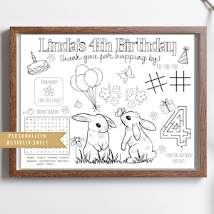 May include: A black and white printable activity sheet for a 4th birthday party. The sheet features a bunny rabbit theme with a word search, a noughts and crosses game, a maze, and a count-the-flowers activity. The text "Linda's 4th Birthday" and "Thank you for hopping by!" is at the top of the sheet.