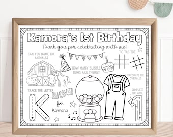 May include: Black and white printable birthday activity sheet for a child's first birthday. The sheet features a variety of activities, including tracing the letter K, counting bubble gum, tic-tac-toe, and a maze. The text on the sheet reads "Kamora's 1st Birthday" and "Thank you for celebrating with me!"