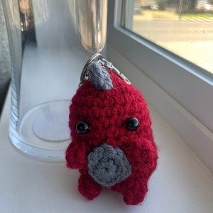 Crochet dinosaur keychain