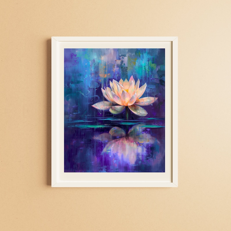 May include: A framed art print featuring a serene lotus flower painting. The artwork showcases a light pink and yellow lotus floating on water, with a vibrant blue and purple background. The painting is framed in a white border.