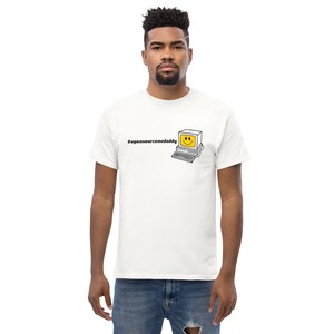 May include: White t-shirt with a black and white illustration of a computer with a smiley face on the screen. The text '#opensourcemedaddy' is printed on the shirt.