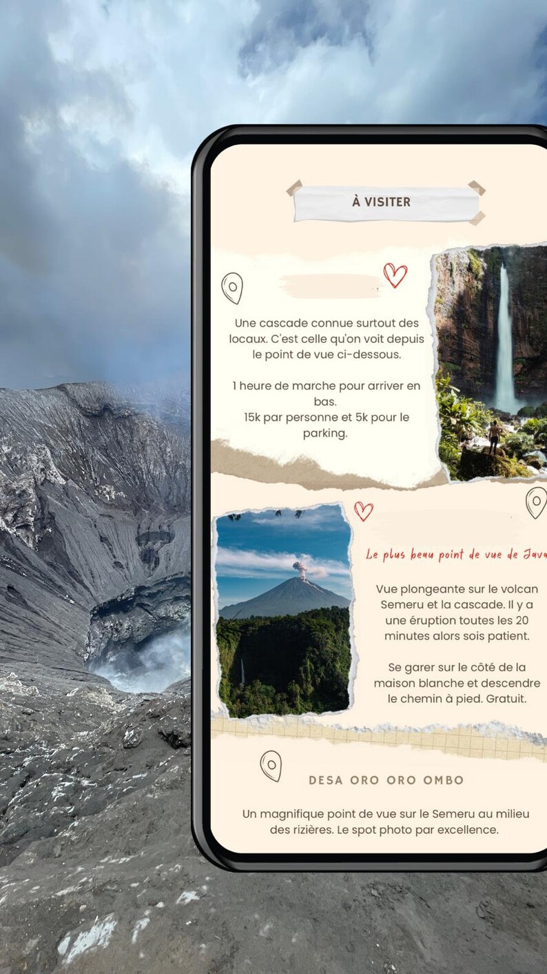 May include: A smartphone screen displaying a travel guide to Java, Indonesia. The guide features photos of a waterfall, a volcano, and a rice paddy field. The text on the screen reads "&Agrave; VISITER" and "DESA ORO ORO OMBO".
