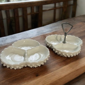 May include: Two white milk glass divided serving dishes with a raised dot pattern. One dish has a silver handle.