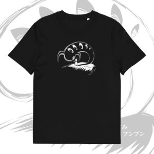 May include: Black t-shirt featuring a white illustration of a figure facing a creature with multiple eyes. The design includes Japanese text and a stylized, abstract background. A unique graphic tee.