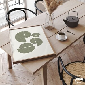 Geometric and organic shapes art print in modern living room.