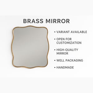 May include: A brass mirror with a wavy, irregular edge. The mirror has a gold-colored frame and a reflective surface. Text on the image reads "BRASS MIRROR", "VARIANT AVAILABLE", "OPEN FOR CUSTOMIZATION", "HIGH-QUALITY MIRROR", "WELL PACKAGING", and "HANDMADE".