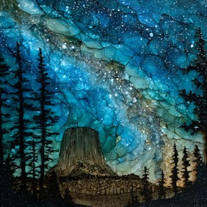 May include: An alcohol ink painting depicting a night sky filled with a vibrant blue and teal nebula, featuring a prominent central rock formation silhouette and dark, detailed pine tree outlines against a starry, cosmic background.