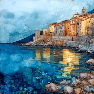 May include: An abstract painting depicts a coastal town with buildings in shades of yellow, orange, and beige, set against a blue sky and sea. The water reflects the buildings, with gold accents throughout the artwork. Rocks and pebbles are visible in the foreground.