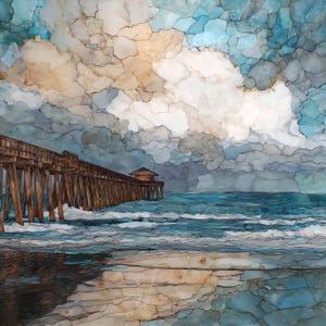 May include: A square wall art piece featuring a coastal scene with a wooden pier extending into the ocean. The sky is filled with large, layered clouds in shades of white, beige, and blue. The water is turquoise, and the sand is tan and brown.
