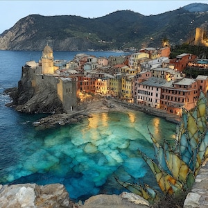 May include: A coastal village with multi-colored buildings nestled on a rocky cliffside overlooking a turquoise bay. A prominent stone church tower stands on the left, while a large, spiky succulent plant occupies the foreground.