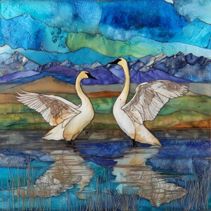 May include: A stained glass style artwork depicting two white swans with outstretched wings standing in a blue lake. The background features layered mountains in shades of purple and blue under a starry sky, with tall thin reeds in the foreground.