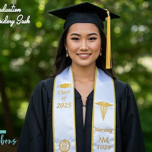 May include: White and gold graduation sash with the text "Class of 2025" and a caduceus symbol. The sash also says "Nursing MN 1029".