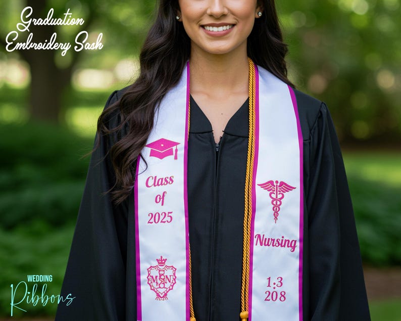 May include: White graduation sash with pink embroidery. The sash says "Class of 2025" and "Nursing 1:3 208". There is a pink caduceus symbol and a pink crest with the letters "MSN".