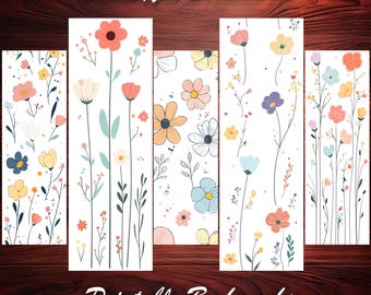 May include: Five printable bookmarks featuring different floral designs. Each bookmark has a white background with colorful flowers and leaves. The text "Beautiful Bookmarks" and "Printable Bookmarks" is included on the image.