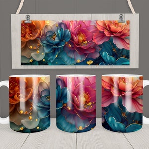 May include: Three white ceramic mugs featuring a floral design. The mugs showcase a close-up of colourful flowers with gold accents. The flowers are a mix of pink, blue, and orange.