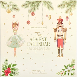 May include: A square tea advent calendar box with a cream background featuring a ballerina and a nutcracker illustration. Text reads New English Teas Tea Advent Calendar 25 Individual Boxes Of Tea Each Containing 2 Teabags Net Wt 75g 2.6oz 50 Assorted Teabags.