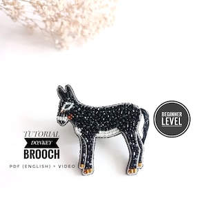 May include: A black and white beaded donkey brooch with a beginner level tutorial. The tutorial includes a PDF in English and a video.  The text on the image reads "Tutorial Donkey Brooch PDF (English) + Video"