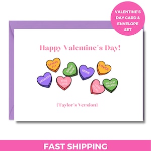 May include: A Valentine's Day card and envelope set with a purple envelope. The card features the text "Happy Valentine's Day!" and heart-shaped candies with phrases like "Fearless" and "Lover". The text "(Taylor's Version)" is also included.