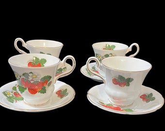 Set of 4 strawberry teacups and saucers