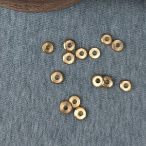 Golden flat large brass bead 6 mm * 1.5 mm hole thickness 2.1 mm made of brass disc spacer bead for DIY jewelry making from India