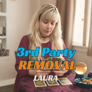 May include: A person is holding tarot cards with the text "3rd Party Removal" and "LAURA" in the image. A crystal ball, a small dish with snacks, and a decorative jar are on the table. The scene is set indoors with natural light.