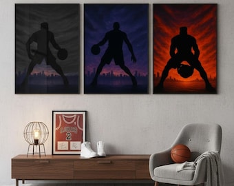 May include: Three framed basketball art prints featuring a silhouette of a player dribbling a ball against a cityscape backdrop. The color schemes are dark grey, purple, and red. A basketball, jersey, and shoes are on a wooden cabinet.