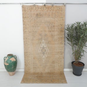 Handwoven Wool Turkish Rug 4x8: Light Brown Vintage Oriental Rug