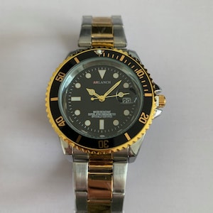 Men&#39;s Watch with two-tone strap in gold and silver